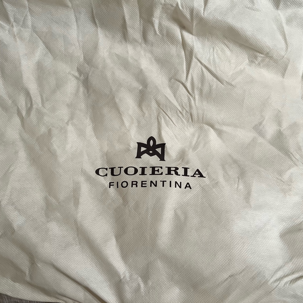 Dust bag tan in color to protect your purse or handbag